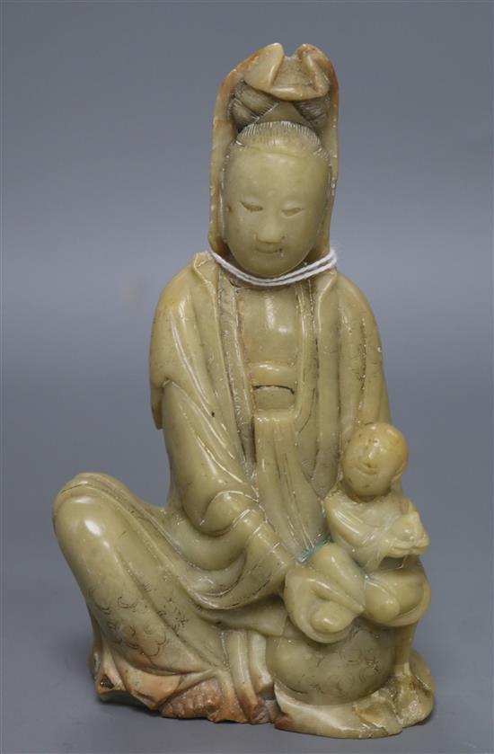 An 17th / 18th century soapstone carving of Guanyin height 15cm An 17th / 18th century soapstone carving of Guanyin height 15cm