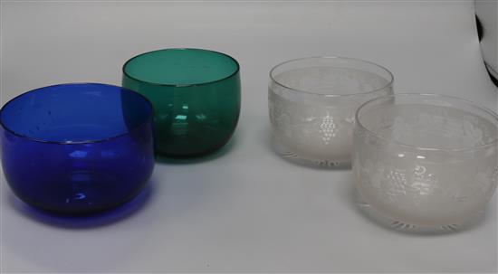 Two Stourbridge cut glass finger bowls and two others in green and blue glass Two Stourbridge cut glass finger bowls and two others in green and blue glass