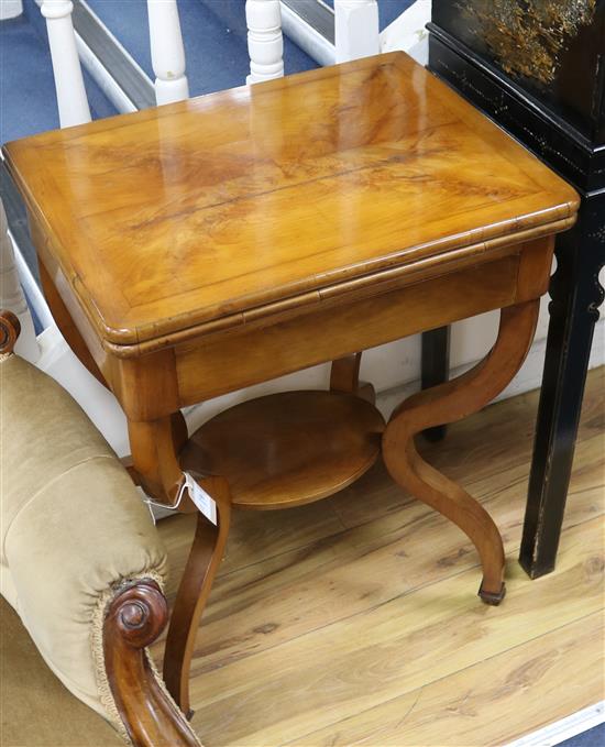 A mid 19th century Danish birch folding top card table W.57cm A mid 19th century Danish birch folding top card table W.57cm