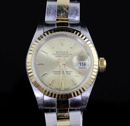 A ladys 2001 steel and gold Rolex Oyster Perpetual Datejust wrist watch, with box and papers. A ladys 2001 steel and gold Rolex Oyster Perpetual Datejust wrist watch, with box and papers.