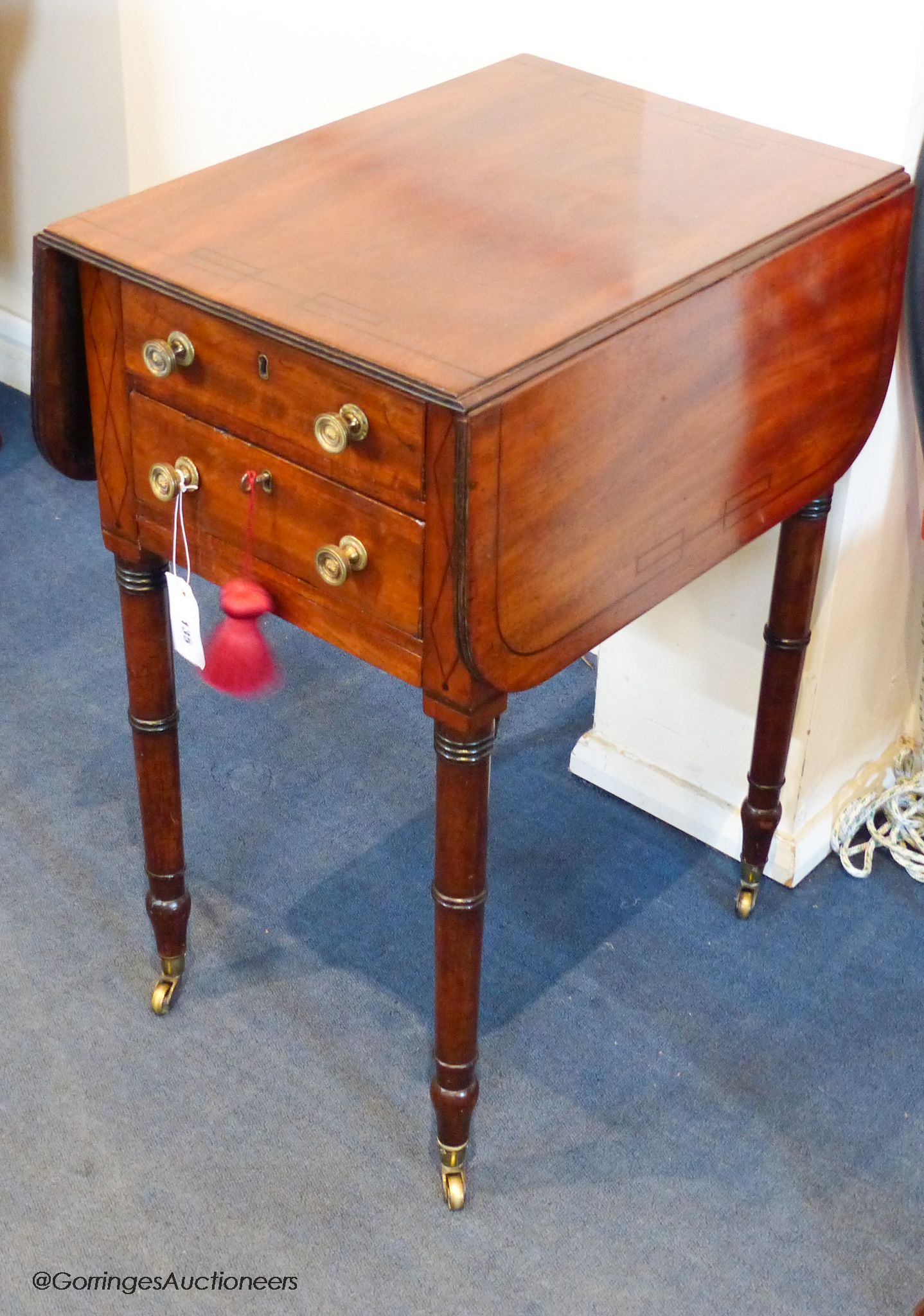 A George IV ebony strung mahogany Pembroke work table, 81 cm wide when open, 70.5 cm high, 52.5 cm deep