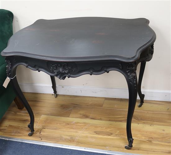 A late Victorian green dralon upholstered armchair A late Victorian green dralon upholstered armchair