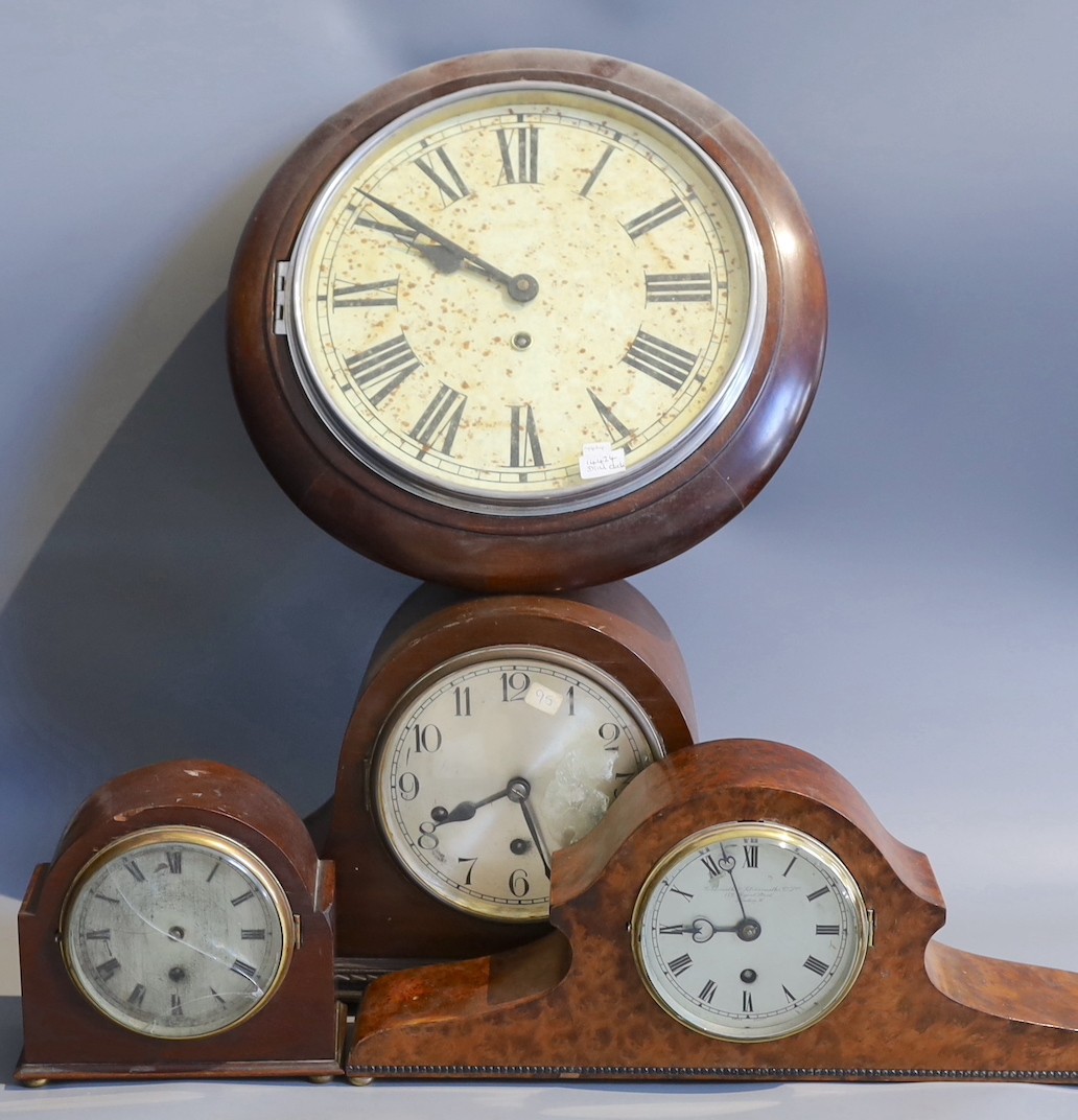 An early 20th century Goldsmiths & Silversmiths amboyna cased mantel clock, width 41cm, together with two other mantel clocks and a wall dial