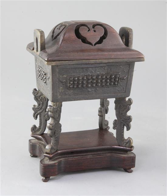 A Chinese bronze censer, fang ding, late Ming dynasty, total height 20cm A Chinese bronze censer, fang ding, late Ming dynasty, total height 20cm