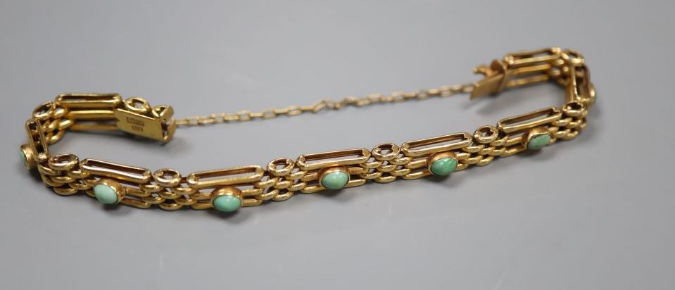 An Edwardian 9ct and nine stone turquoise set gatelink bracelet, approx. 17.5cm,