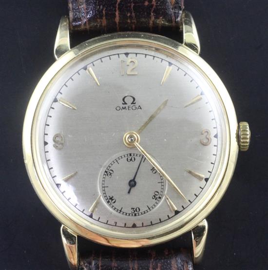 A gentlemans 1940s 18ct gold Omega manual wind bumper movement wrist watch, A gentlemans 1940s 18ct gold Omega manual wind bumper movement wrist watch,