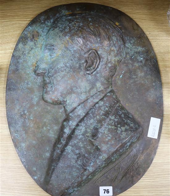 A bronze portrait relief signed G. Van Der Straeten length 53cm