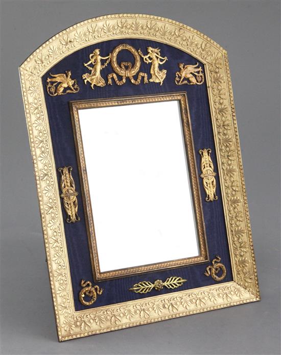 A 19th century French Empire ormolu mounted easel frame toilet mirror, height 10.25in. A 19th century French Empire ormolu mounted easel frame toilet mirror, height 10.25in.