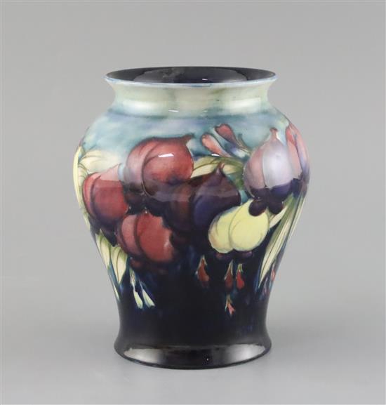 A Moorcroft magnolia vase, 1920s, H. 16.5cm