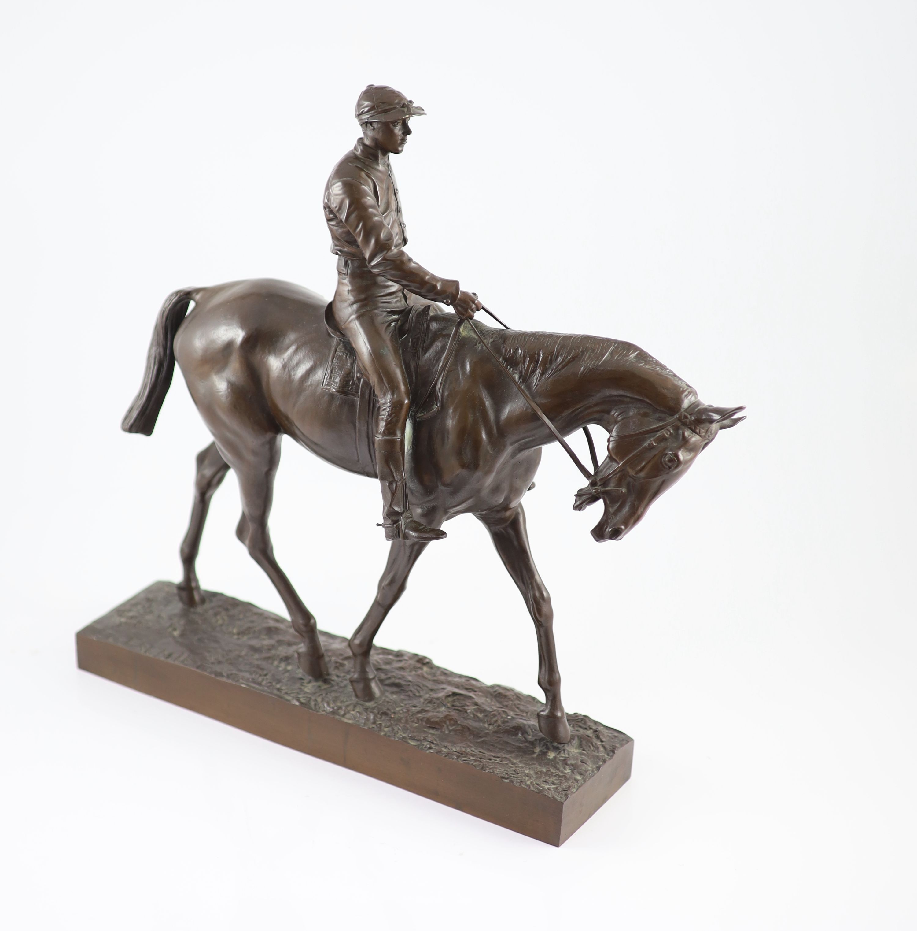 Emanuel Fremiet (1824-1910), a bronze model of a horse and jockey, H 44.5cm. L 46cm.