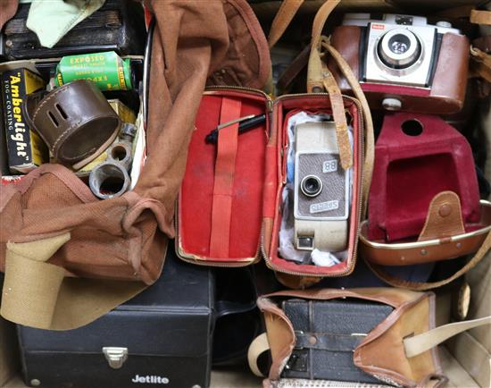 A collection of cameras including a Voigtlander compur rapid