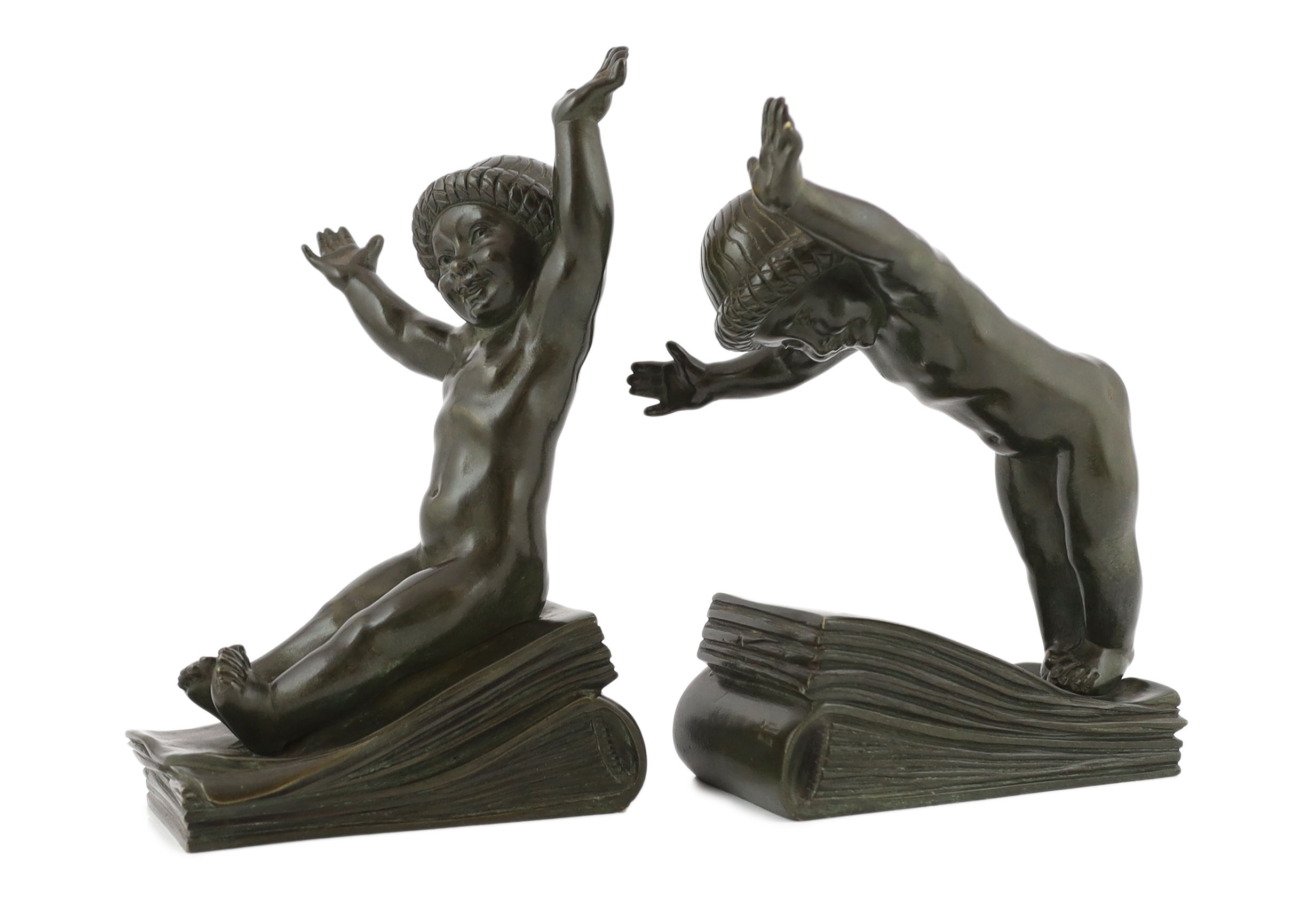 Claude (Claude-Marie Devenet 1851-1931), a pair of French Art Deco bronze bookends, Marcel Guillemard foundry mark, 16cm wide, 25cm high                                                                                    