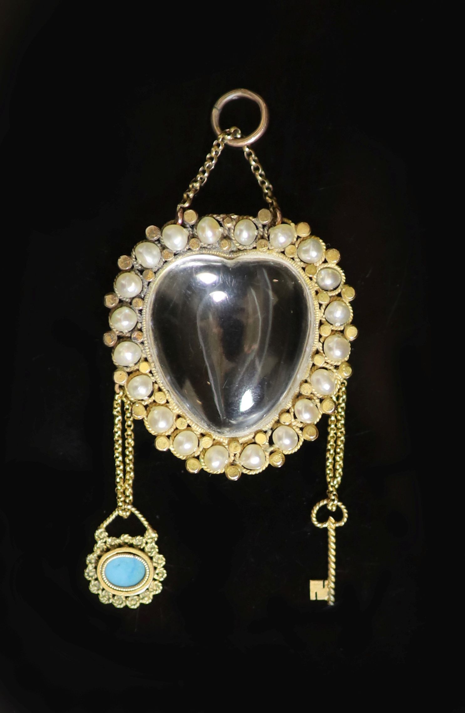 A 19th century gold, rock crystal, seed pearl and turquoise set heart shaped drop pendant                                                                                                                                   