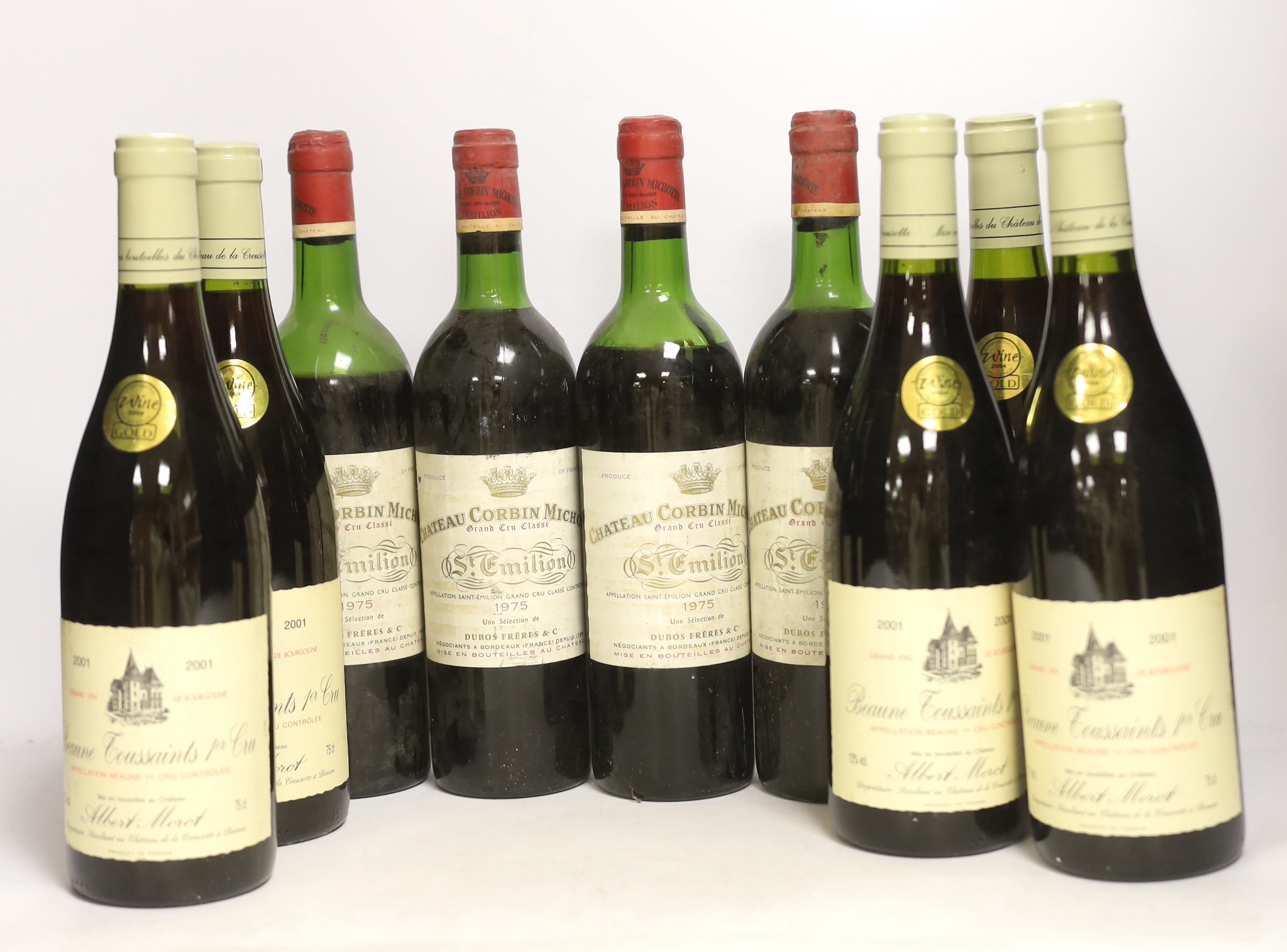 Four bottles of Chateau Corbin Michotte, St. Emilion, 1975 and five bottles of Beaune Toussaints 1er Cru, Albert Morot, 2001.                                                                                               