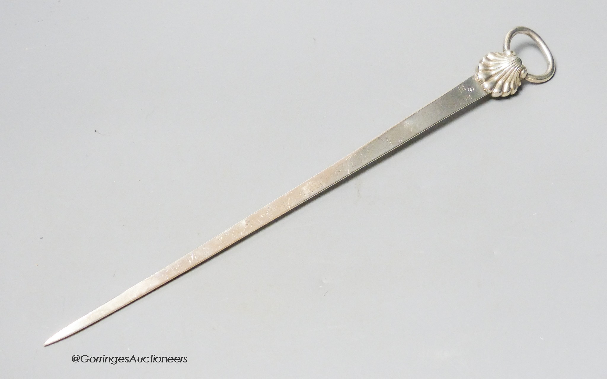 A late George II silver meat skewer, with shell terminal, Samuel Courthauld, London, 1759, 32.7cm, 4oz.                                                                                                                     