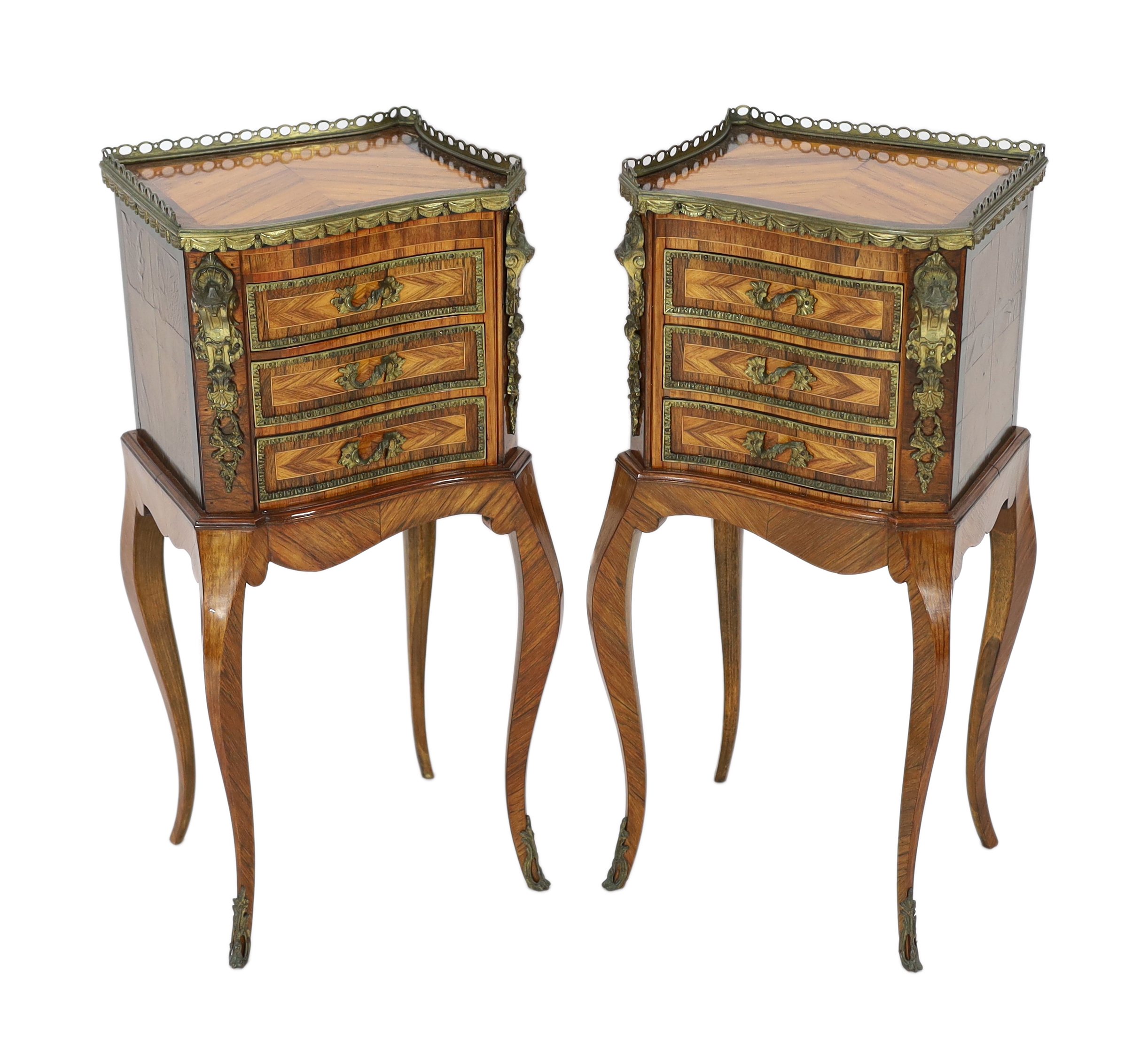 A pair of Louis XVI style ormolu mounted kingwood bedside chests, 34cm wide, 27cm deep, 74cm high                                                                                                                           