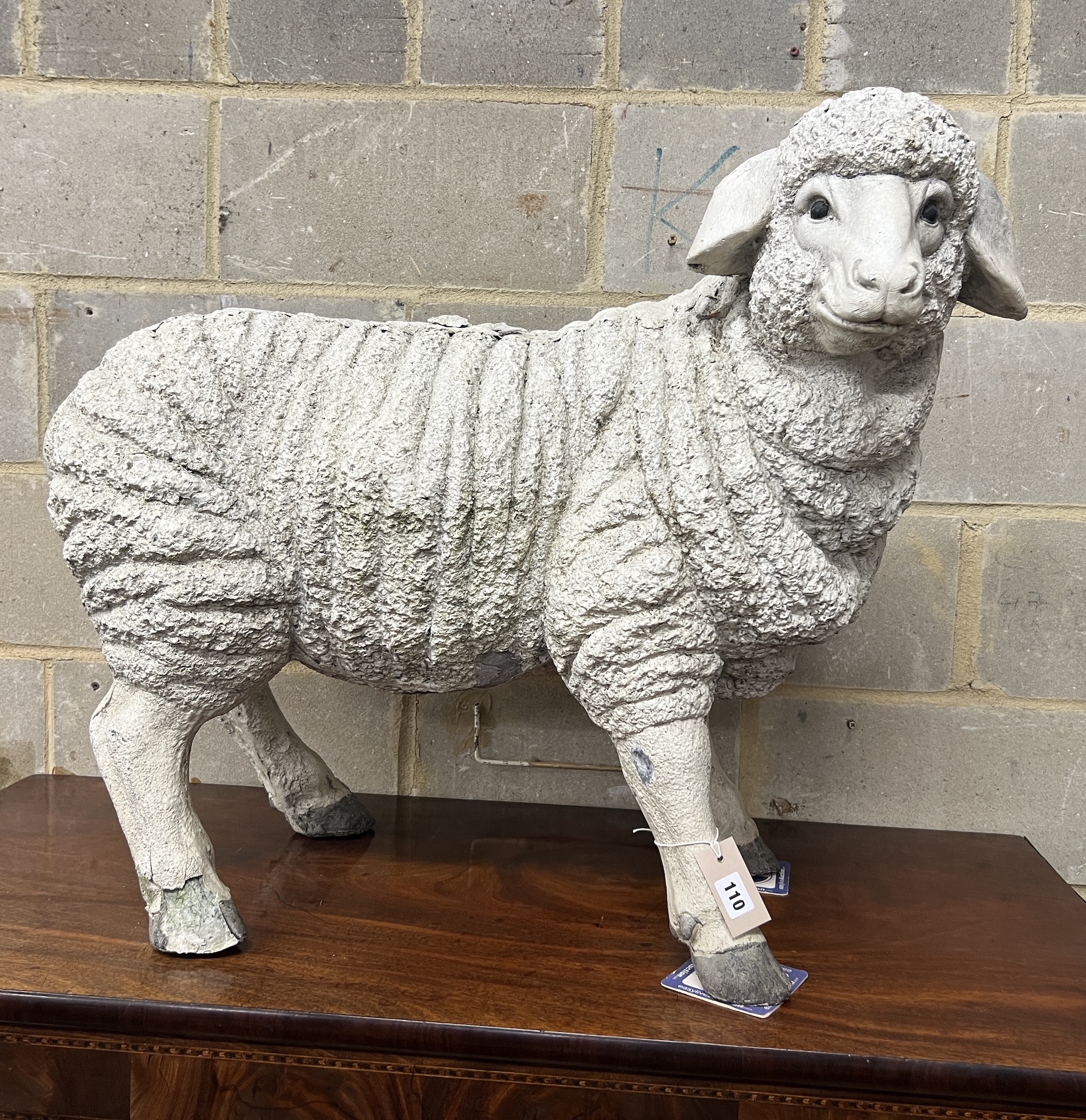 A life size composition sheep garden ornament, height 72cm                                                                                                                                                                  