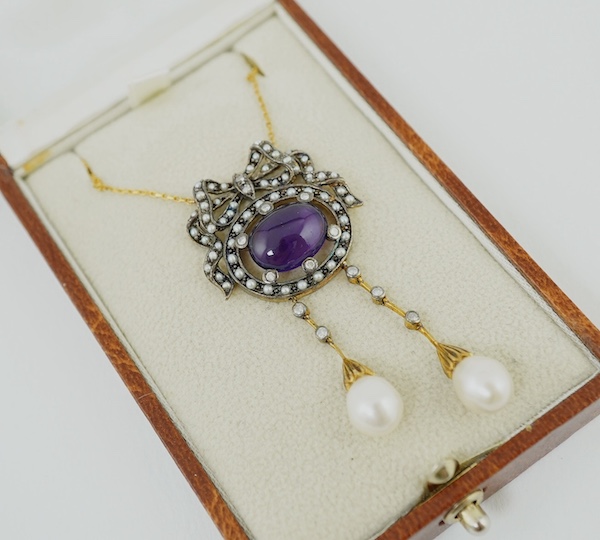 An Edwardian style yellow metal, cabochon amethyst, seed pearl, diamond and cultured pearl double drop pendant, on a 375 chain, pendant 54mm, gross weight 7.5 grams. Condition - fair                                      