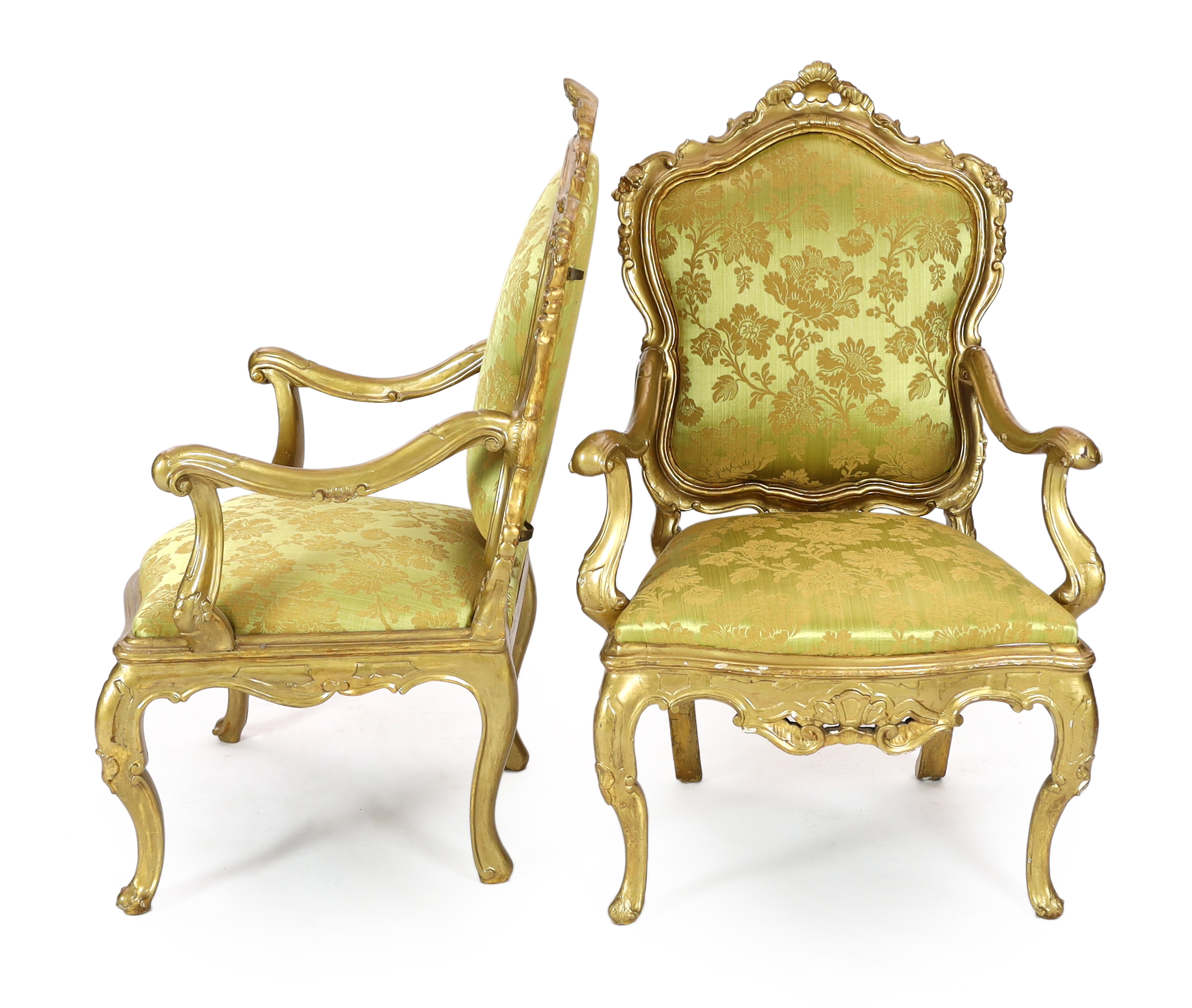 A set of six 18th century Venetian carved giltwood open armchairs, 80cm wide, 68cm deep, 122cm high, Please note this lot attracts an additional import tax of 5% on the hammer price                                       