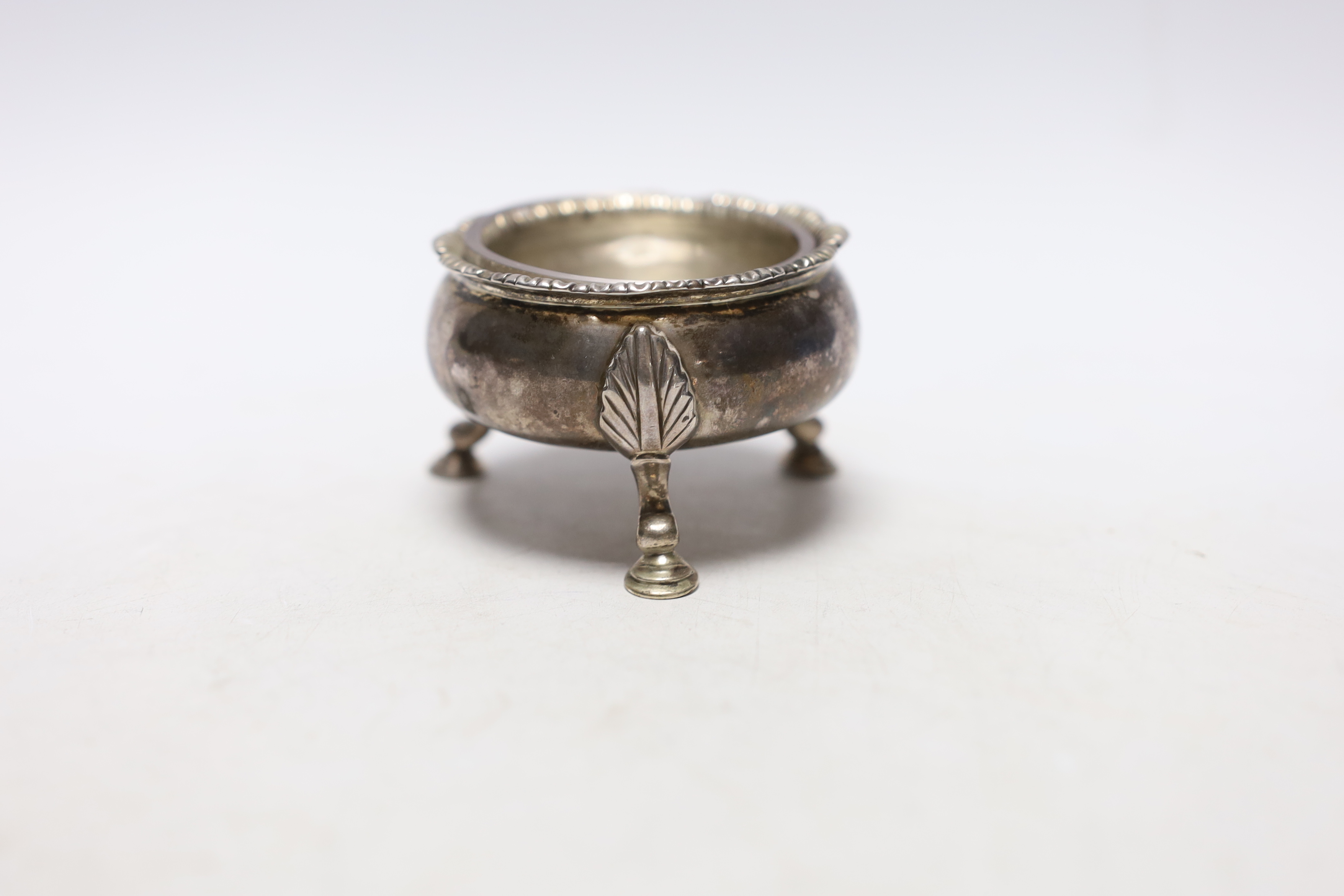 A George III salt cellar, makers Daniel Smith and Robert Sharp, London, 1765, diameter 68mm.                                                                                                                                