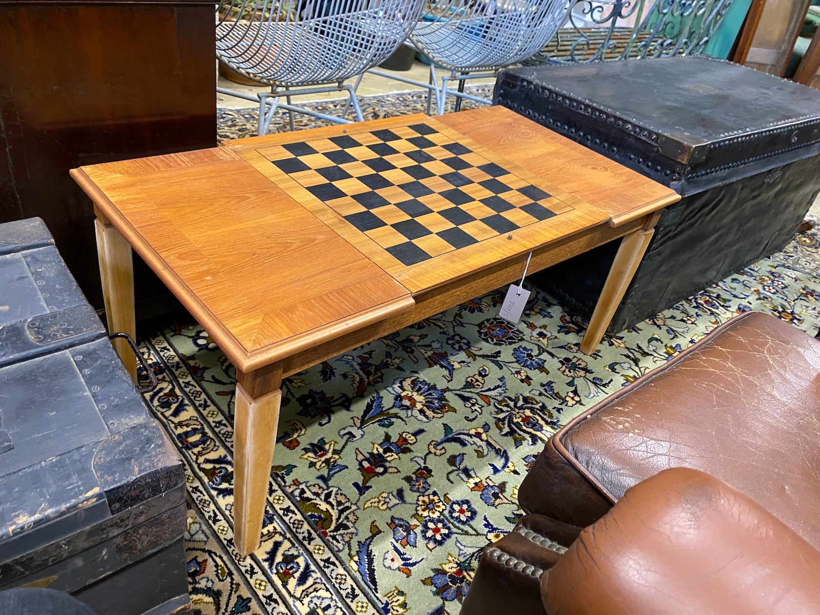 A modern teak hinged top low games table, with backgammon and chess surfaces, width 98cm, depth 50cm, height 43cm                                                                                                           