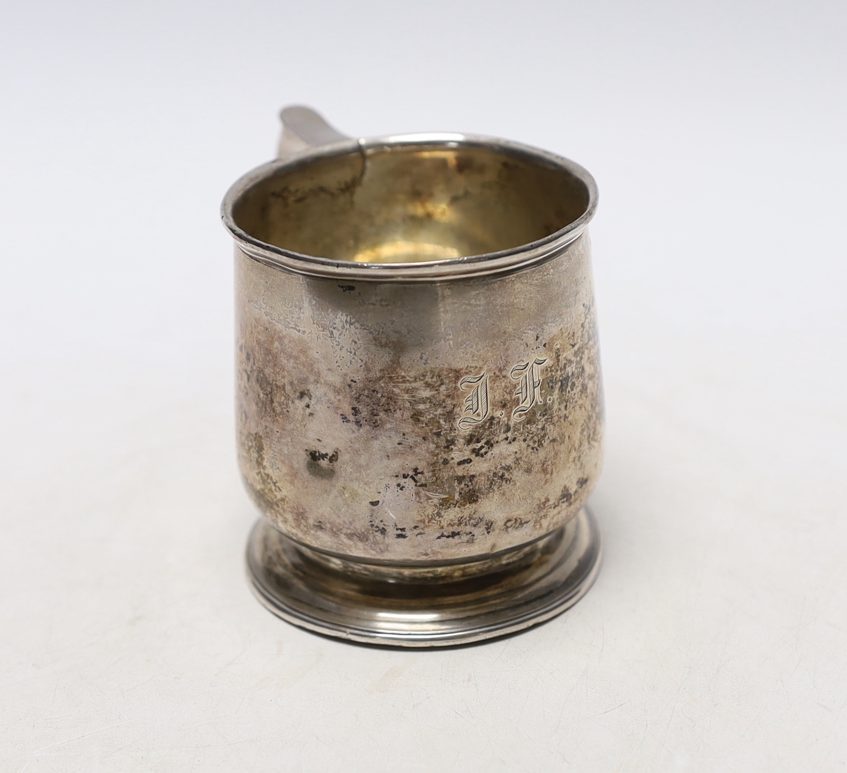 A George V silver christening mug, maker W. Neale Ltd, Birmingham 1927, 76mm.                                                                                                                                               