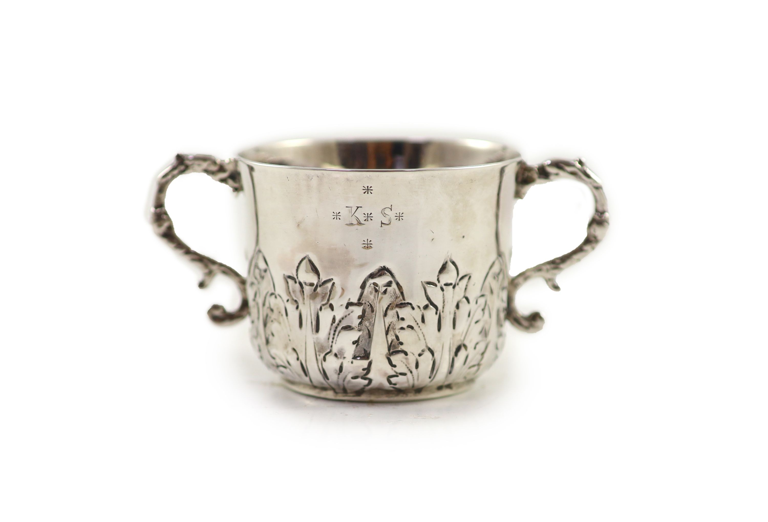 A William III repousse silver porringer, by Jonah Kirk, London c.1695                                                                                                                                                       