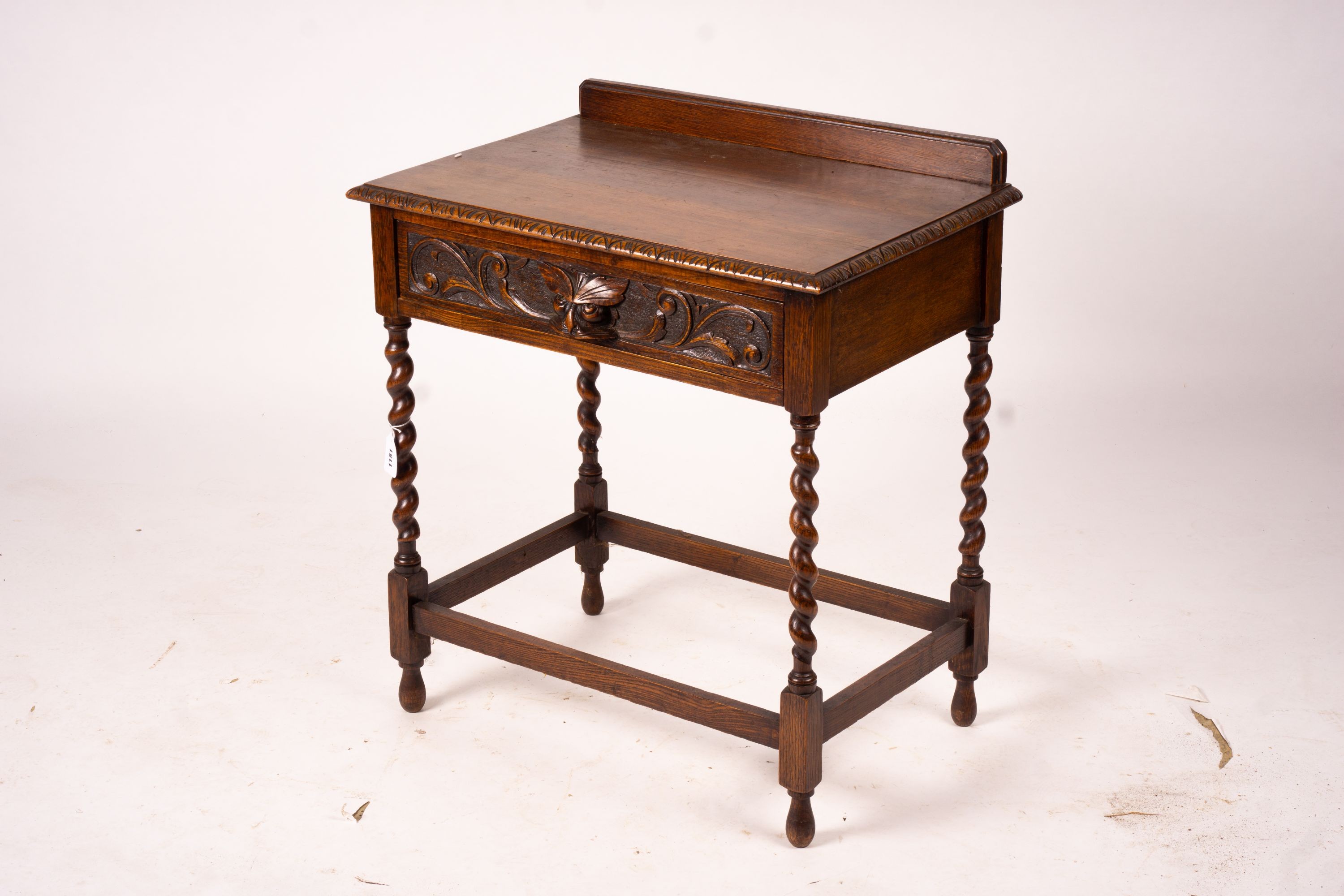 An early 20th century Flemish carved oak side table, W.69cm D.46cm H.77cm                                                                                                                                                   