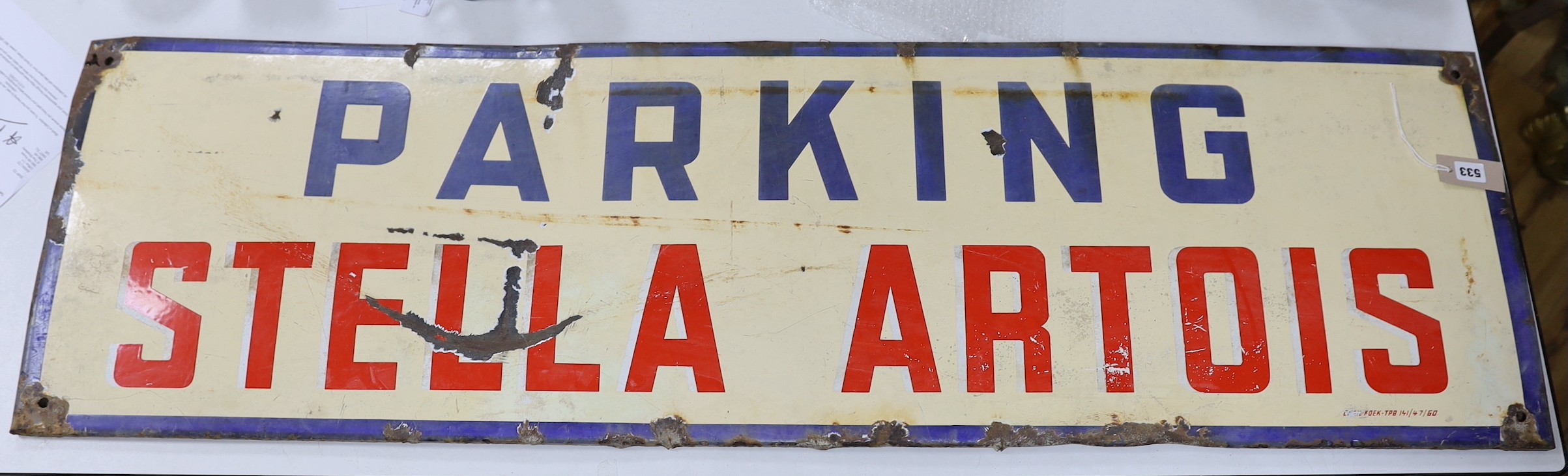 A Stella Artois ‘parking’ enamel sign. 44 x 148cm                                                                                                                                                                           