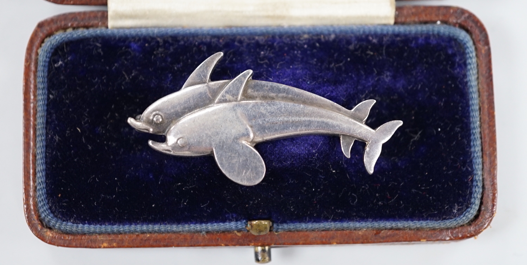 A Georg Jensen sterling twin dolphin brooch, design no. 317, 40mm.                                                                                                                                                          