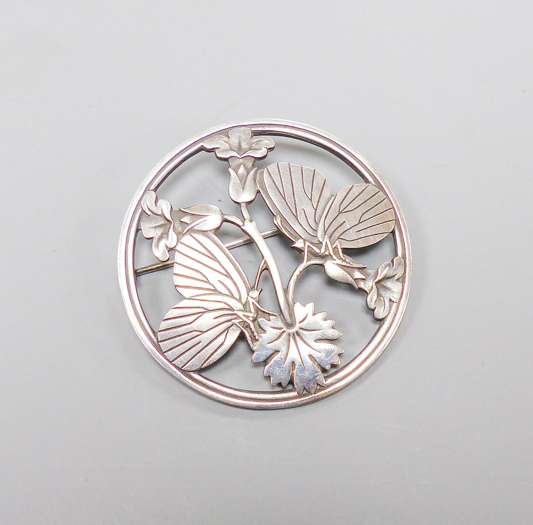 A Georg Jensen sterling circular 'Moonlight Blossom' brooch, no. 283, 51mm.                                                                                                                                                 