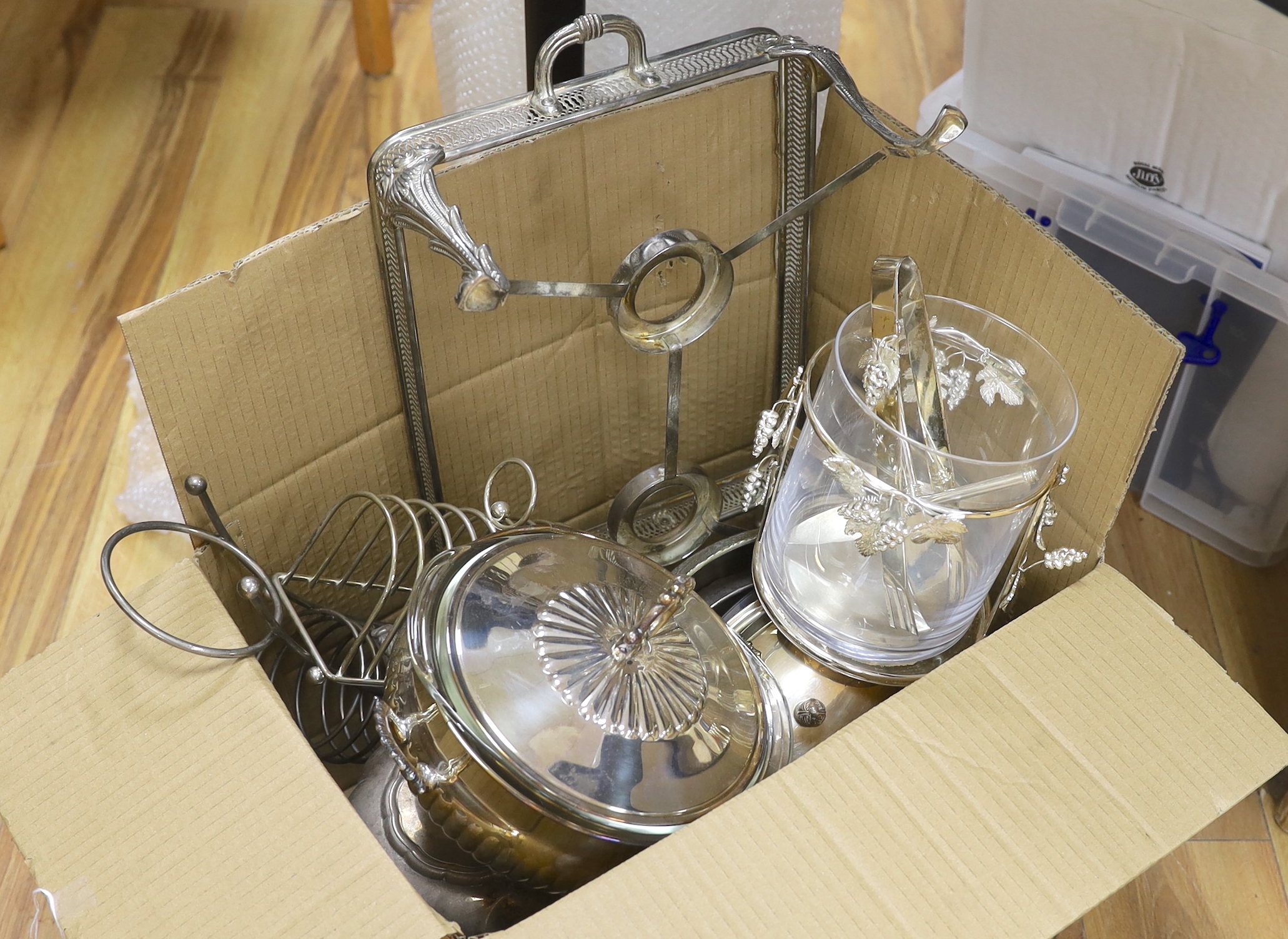 A mixed quantity of silver plate including a teapot and toast rack, the largest 46cm wide                                                                                                                                   