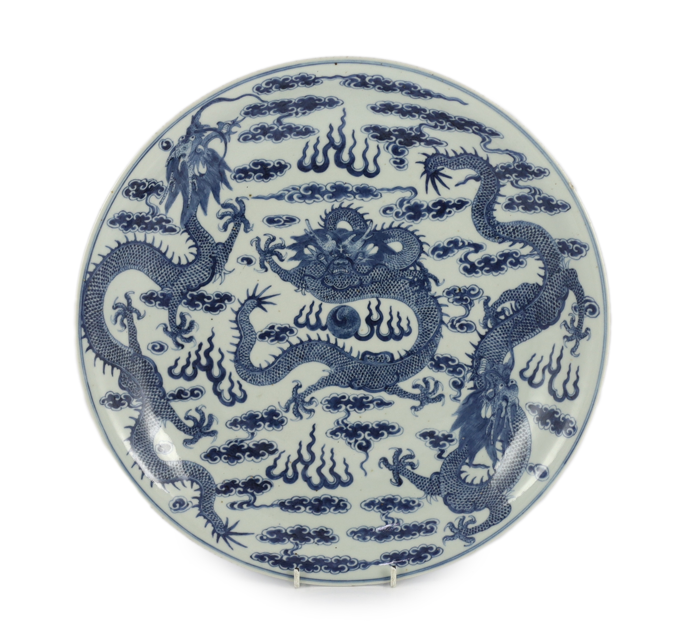 A Chinese blue and white ‘dragon’ dish, Kangxi mark, 19th century                                                                                                                                                           