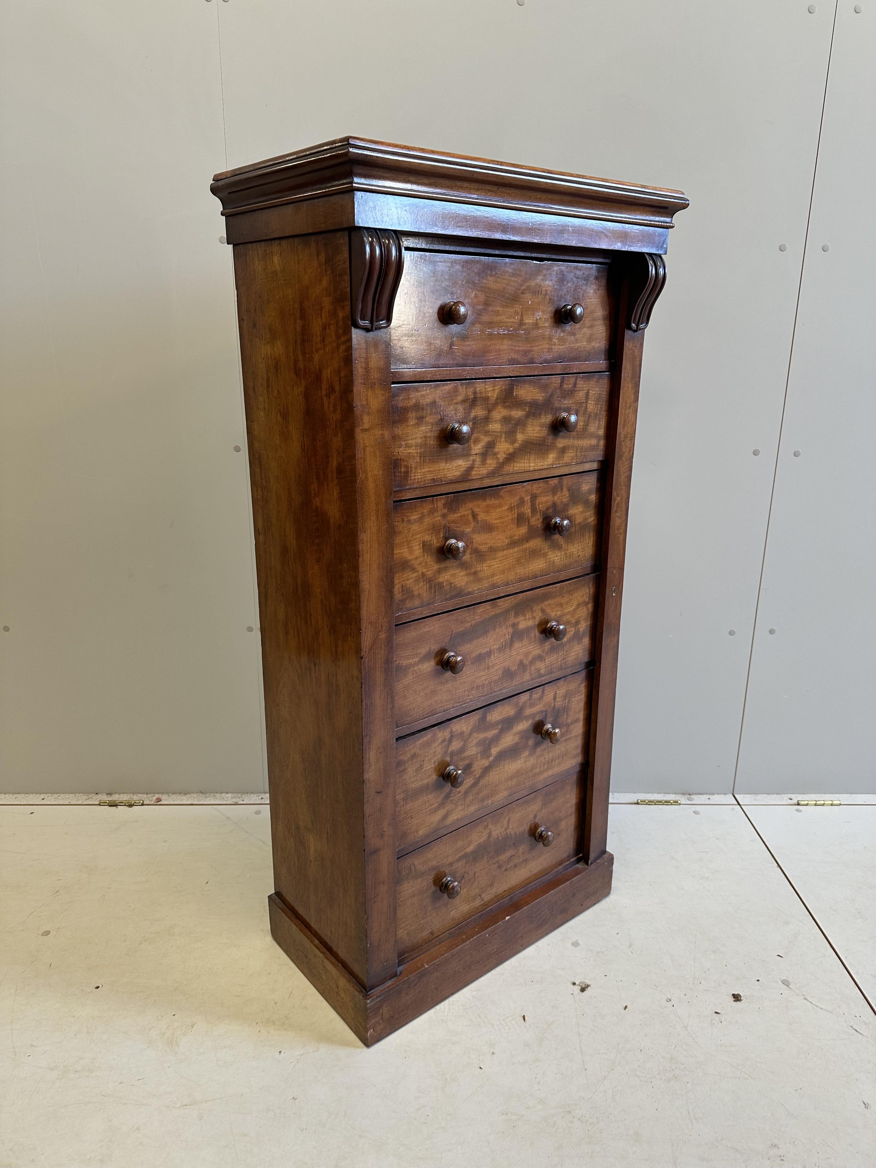 A Victorian mahogany Wellington chest, width 66cm, depth 37cm, height 138cm                                                                                                                                                 