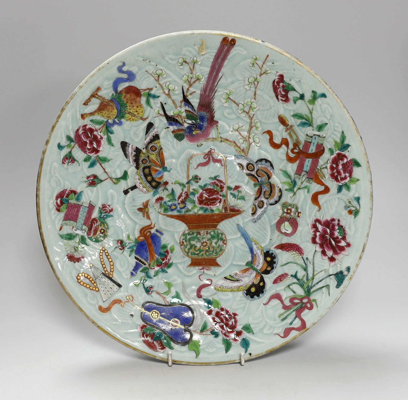 A 19th century Chinese famille rose enamelled carved celadon glazed dish, 34cm                                                                                                                                              