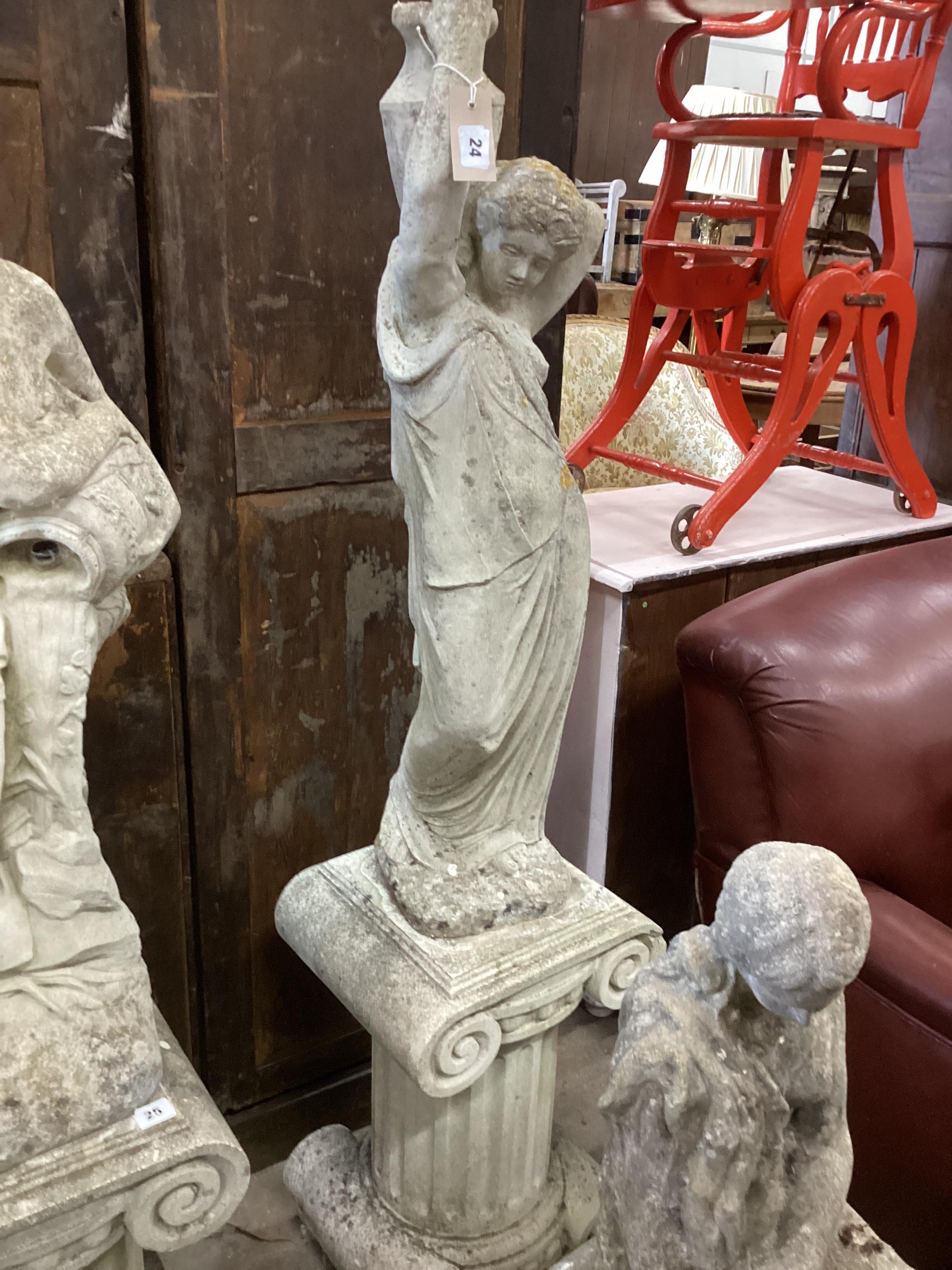 A reconstituted stone Grecian style garden statue, on ionic plinth, height 146cm                                                                                                                                            