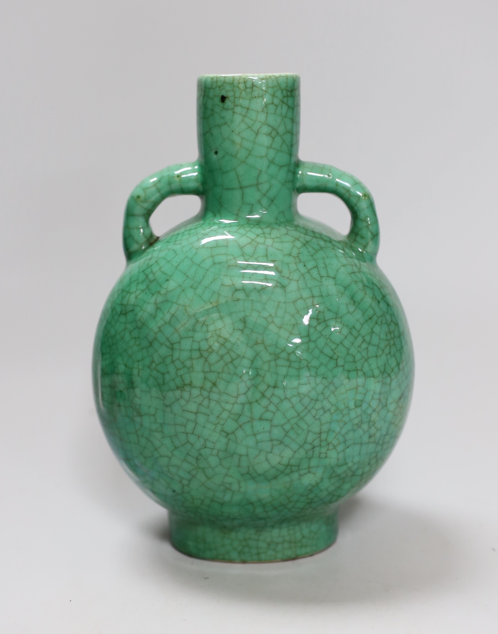A 19th century Chinese green crackle glaze ‘eight trigrams’ moonflask, 19.5cm                                                                                                                                               