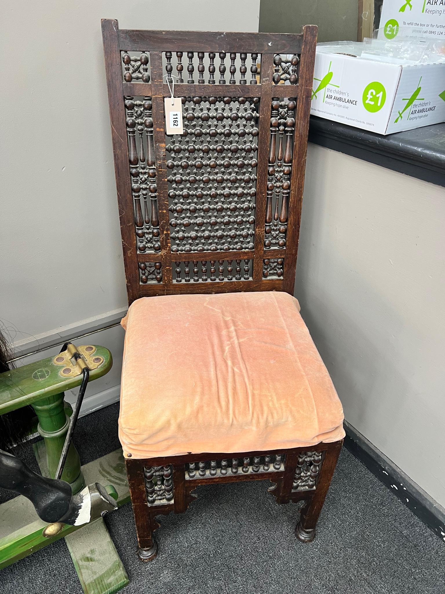 A pair of Liberty-style Moorish hardwood side chairs.                                                                                                                                                                       