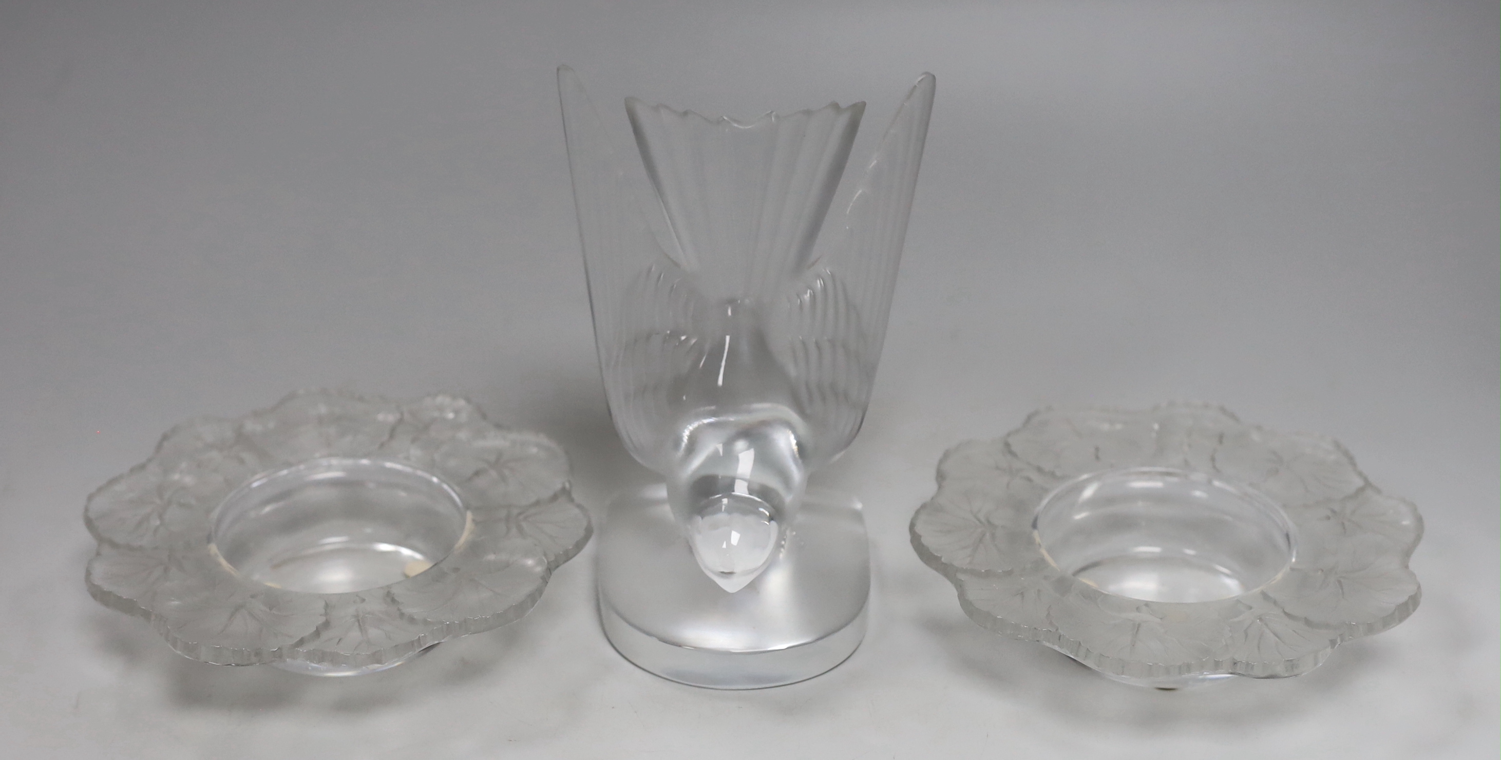 A Lalique Hirondelle bookend and two dishes with leaf design to rims, swallow height 15.8cm (3)                                                                                                                             