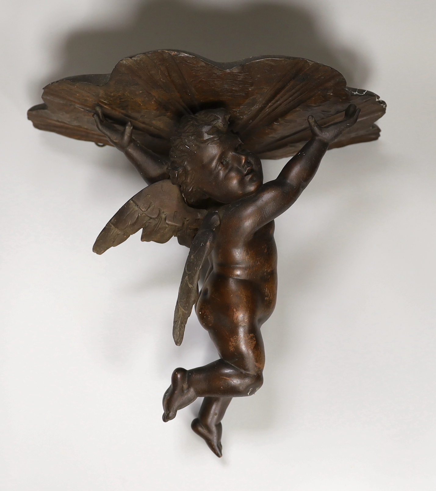 A Venetian carved wood putti wall bracket or sconce, 33cm high                                                                                                                                                              