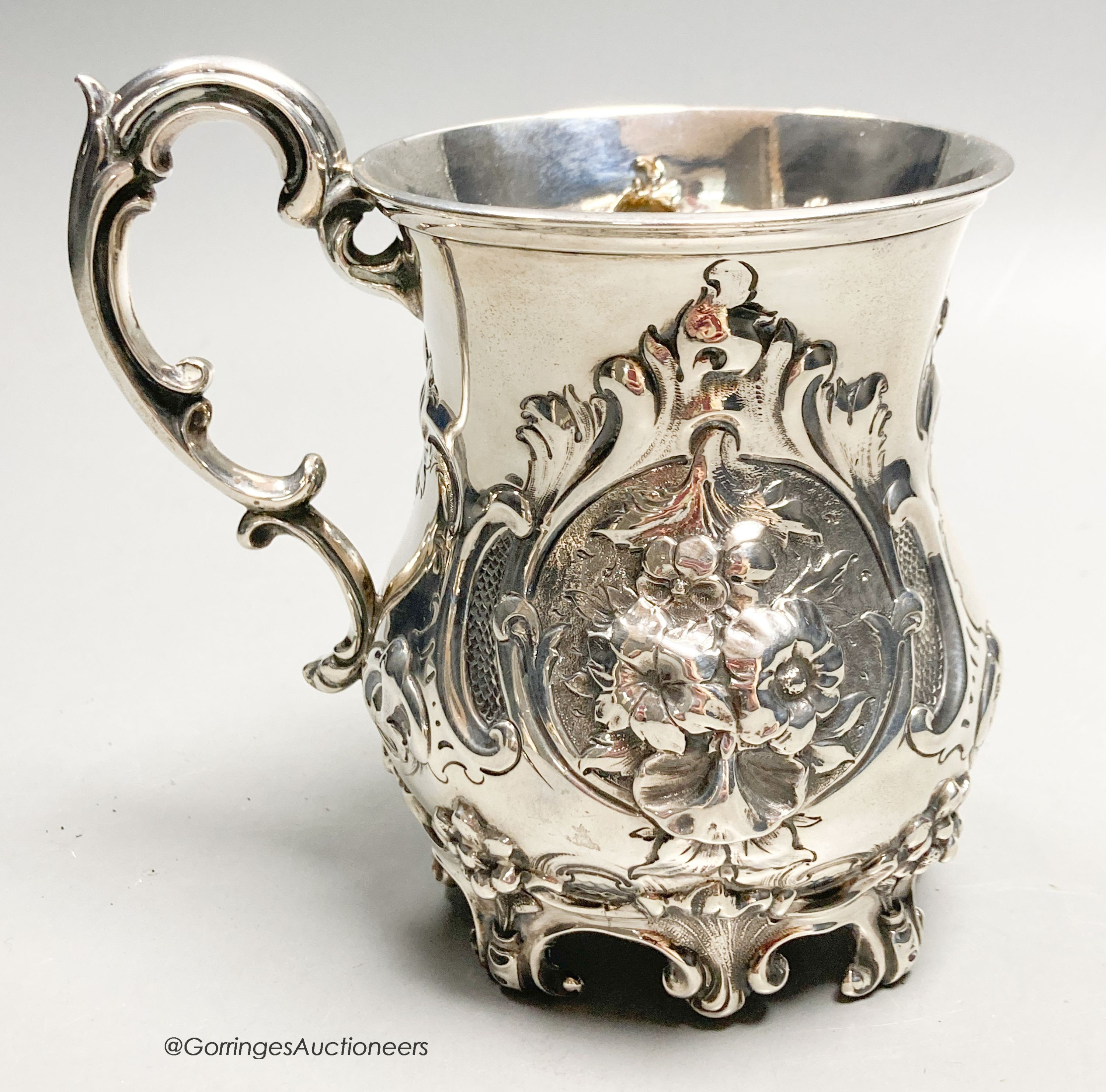 A Victorian embossed silver mug, George John Richards, London 1856, 12.5cm, 7.5 oz.                                                                                                                                         