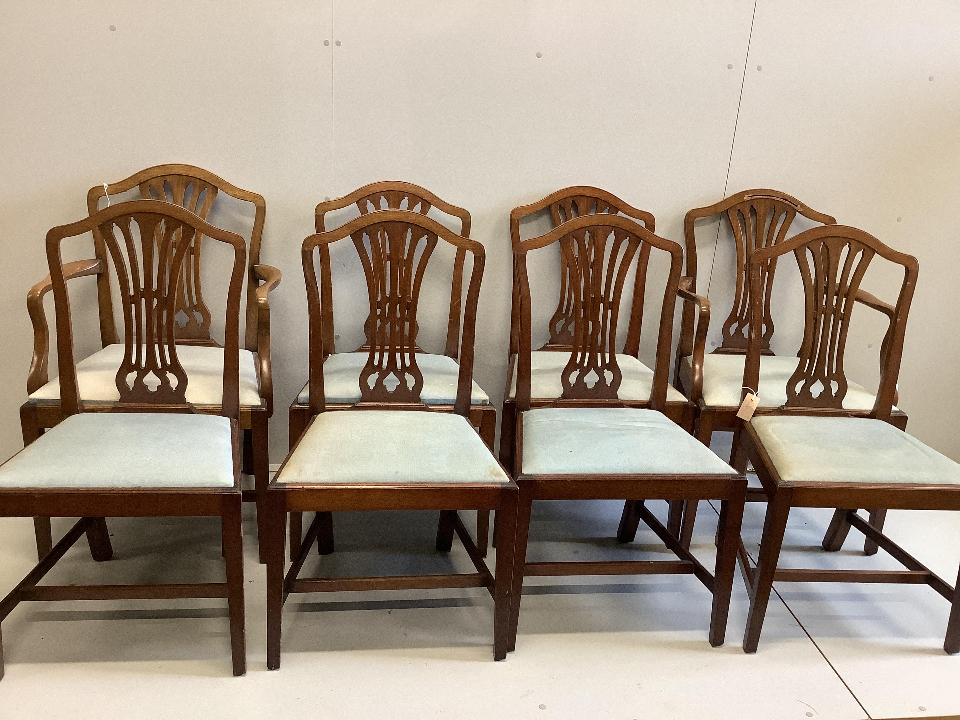 A set of eight George III style mahogany dining chairs, two with arms                                                                                                                                                       
