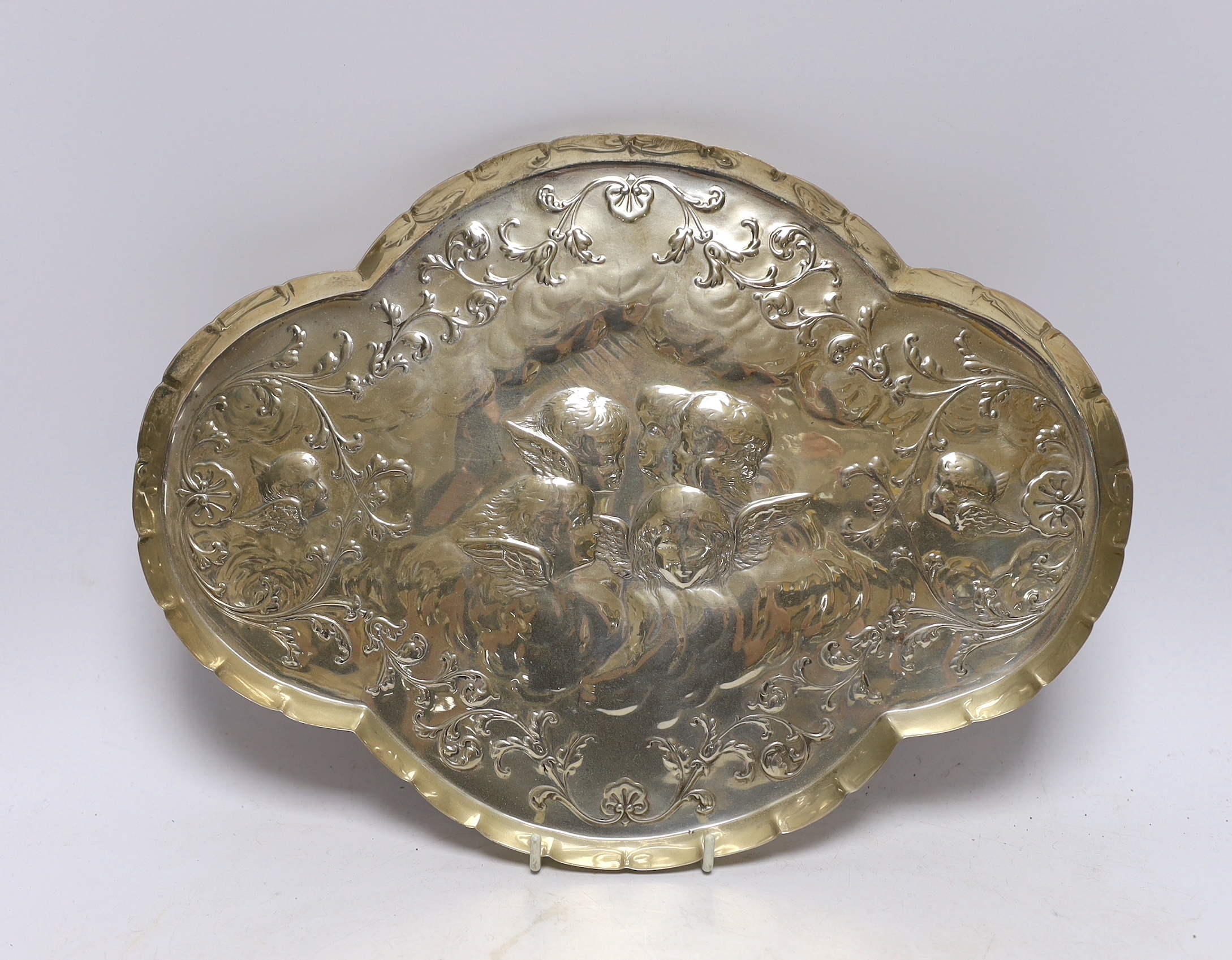 A late Victorian silver 'Reynold's Angels' dressing table tray, by William Comyns, London, 1897, 30.9cm                                                                                                                     
