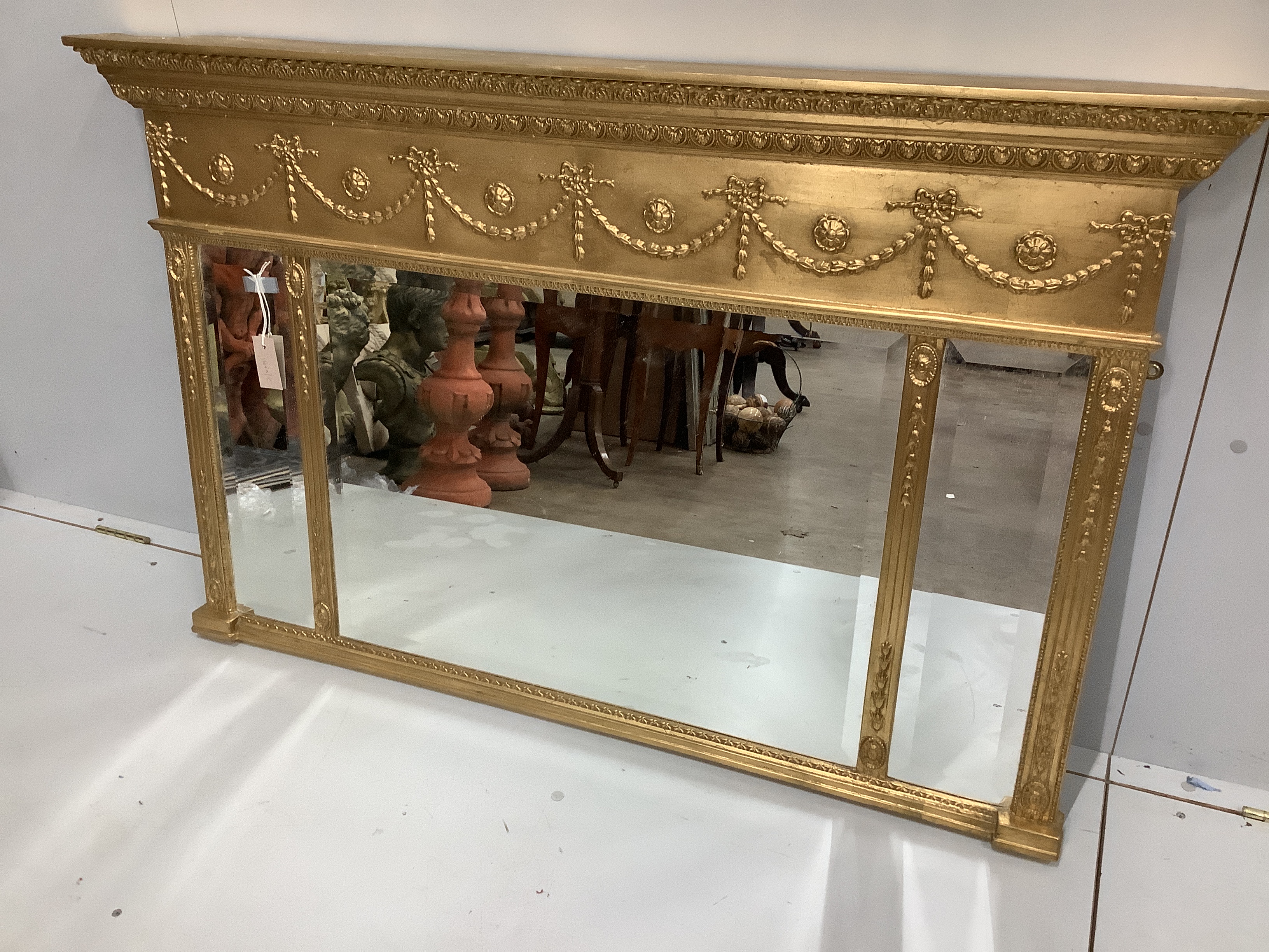 A reproduction Victorian style gilt framed triple plate overmantel mirror, width 130cm, height 81cm                                                                                                                         
