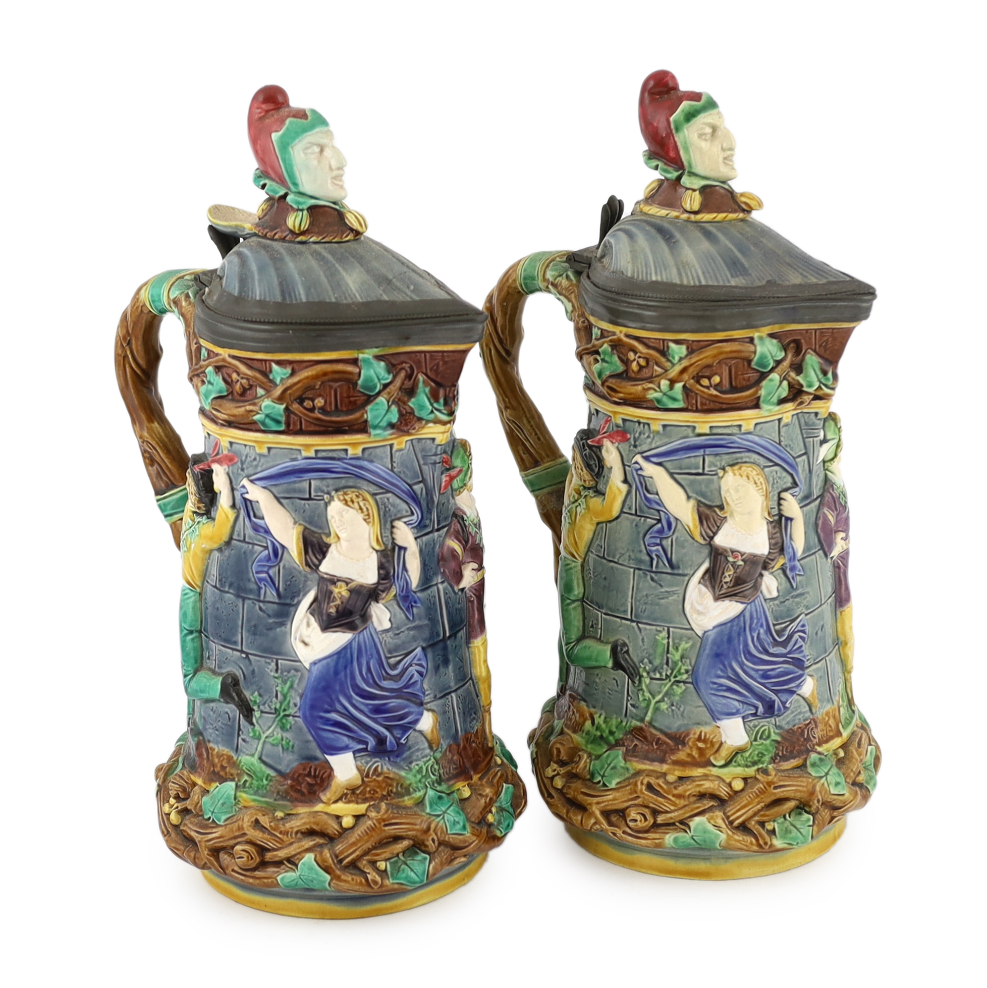 A pair of Victorian Minton majolica ‘Tower’ jugs, 33cm high                                                                                                                                                                 