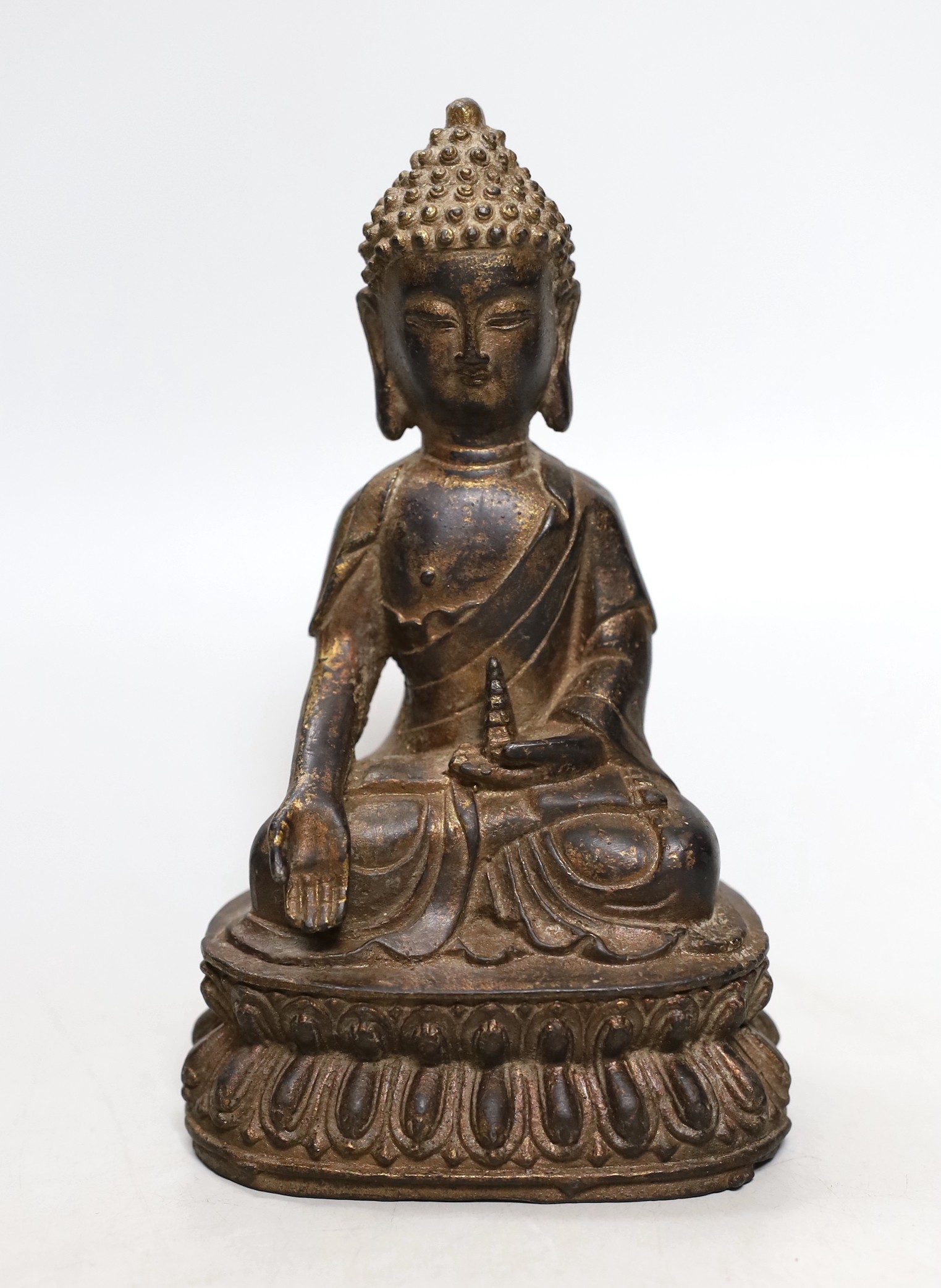 A Chinese gilt iron seated figure of Buddha, 19cm                                                                                                                                                                           