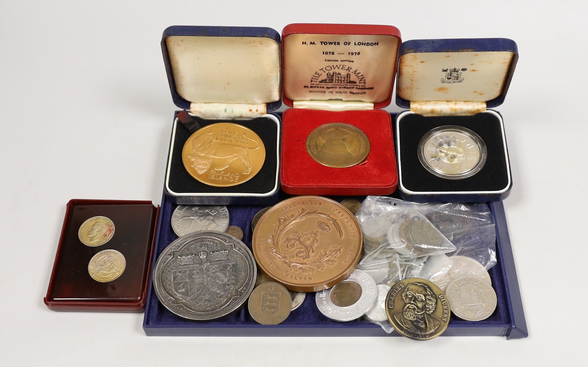 A Princess Louise marriage medal, a Barcelona 1878 valor bronze medal, two Falklands medals (one silver) and a Tower of London medal, and other various coins and medals                                                    