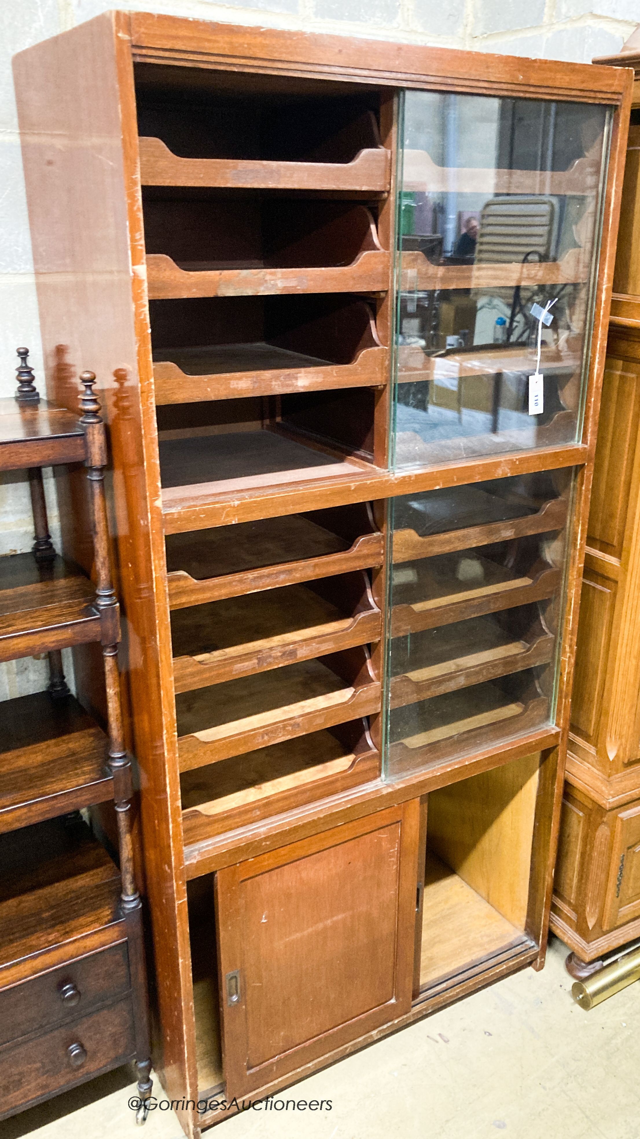 A mid century teak haberdashery cabinet, width 92cm, depth 50cm, height 194cm                                                                                                                                               