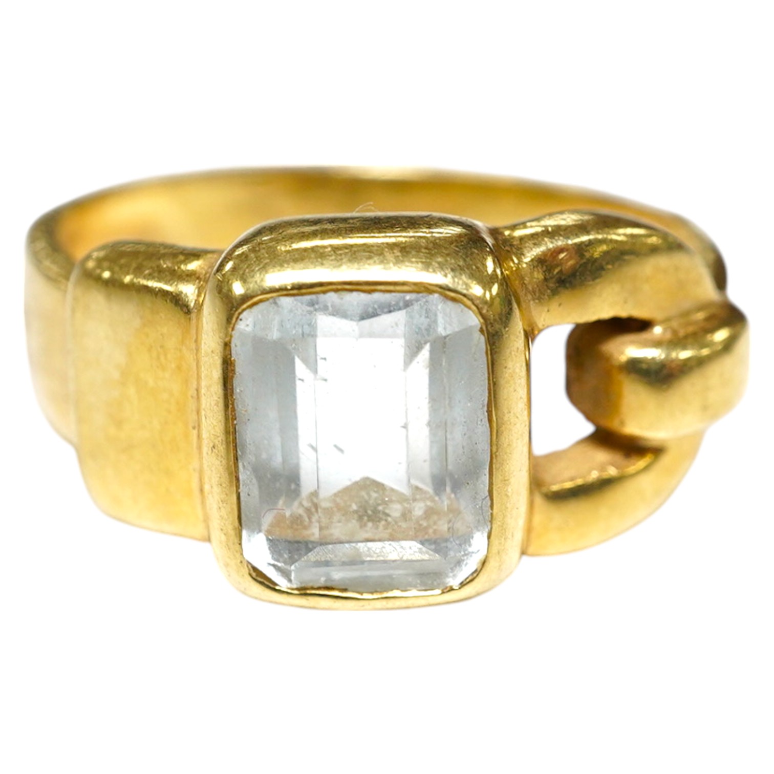 An 18ct gold aquamarine set buckle ring, size O, gross 6.1 grams Condition, fair.                                                                                                                                           