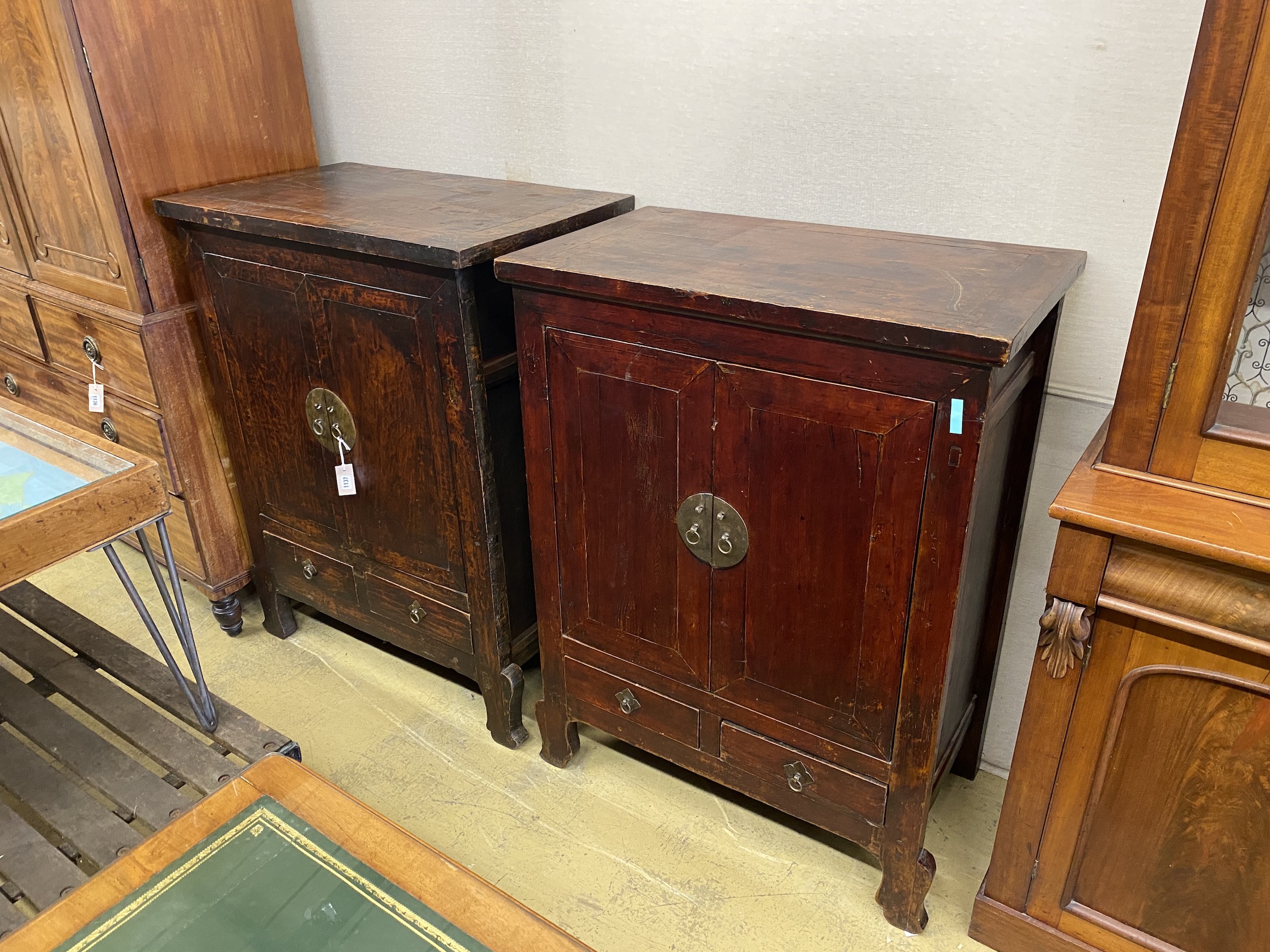 A near pair of Chinese hardwood lacquer side cabinets, larger width 91cm, depth 55cm, height 117cm                                                                                                                          